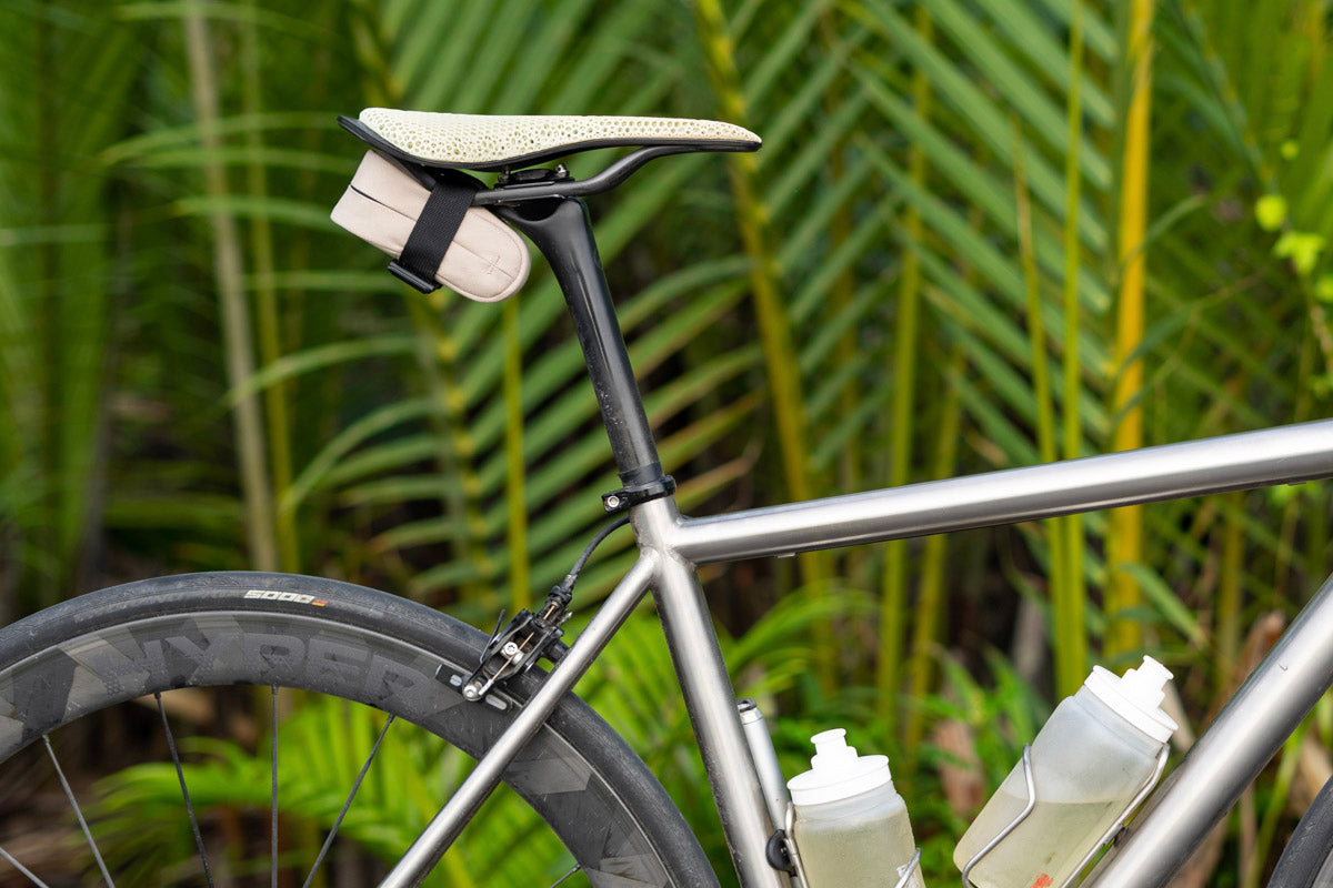 Side view shot a road bike with the Post Carry Co. Saddle Bag mounted on the bike